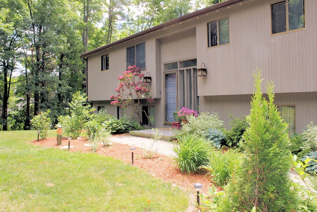 33 Sunset Road Carlisle, MA 01741 - Photo 26 of 27 a front view of a house having yard