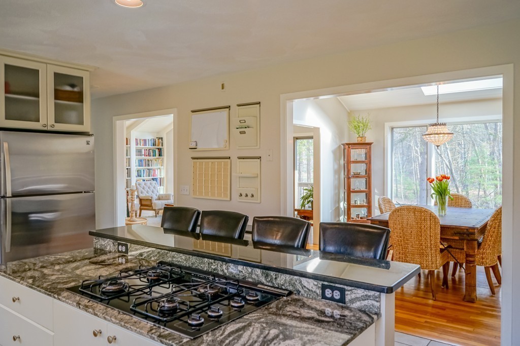 33 Sunset Road Carlisle, MA 01741 - Photo 6 of 27 a living room with furniture and a rug