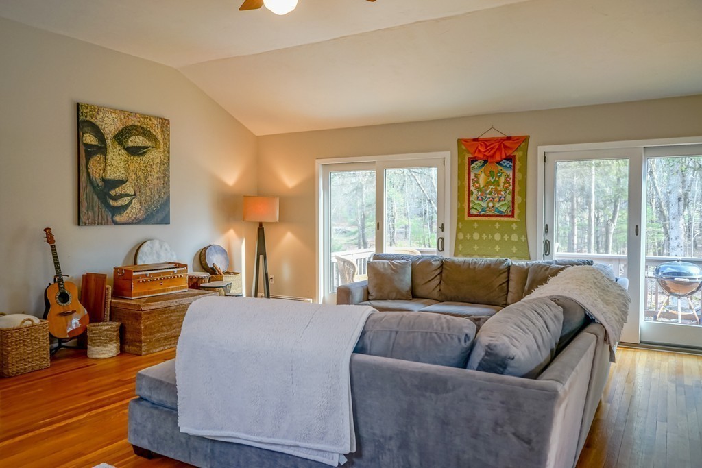 33 Sunset Road Carlisle, MA 01741 - Photo 8 of 27 a living room with furniture and a large window