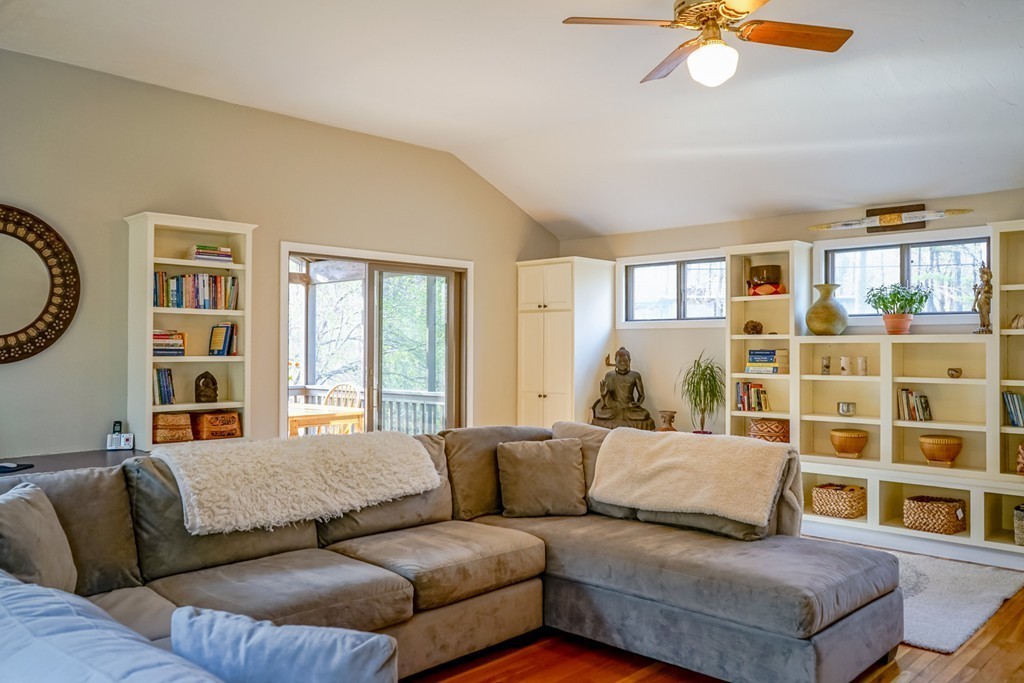 33 Sunset Road Carlisle, MA 01741 - Photo 9 of 27 a living room with furniture and a large window