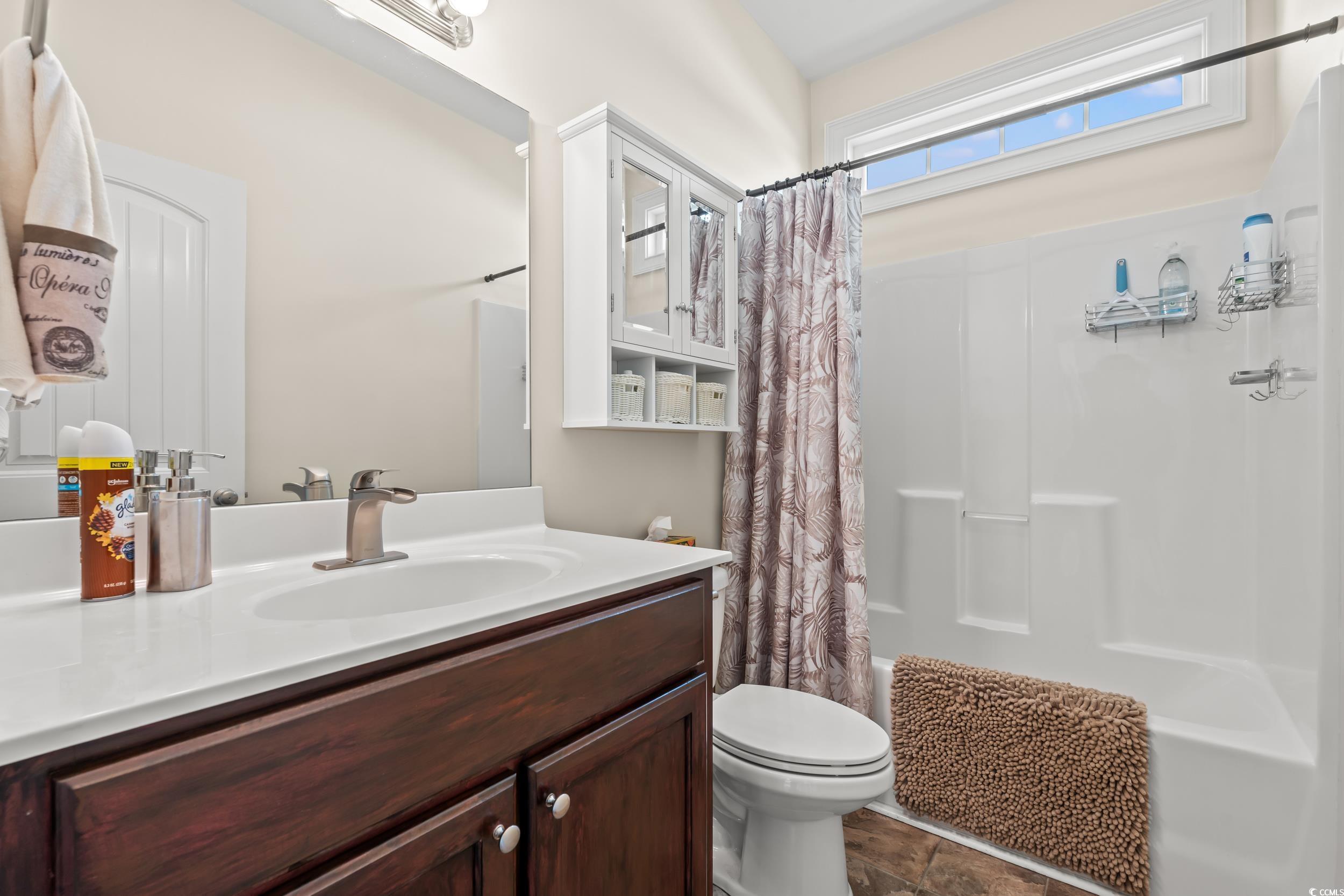 153 Grier Crossing Road Conway, SC 29526 - Photo 16 of 26 Bedroom featuring dark colored carpet and ceiling fan