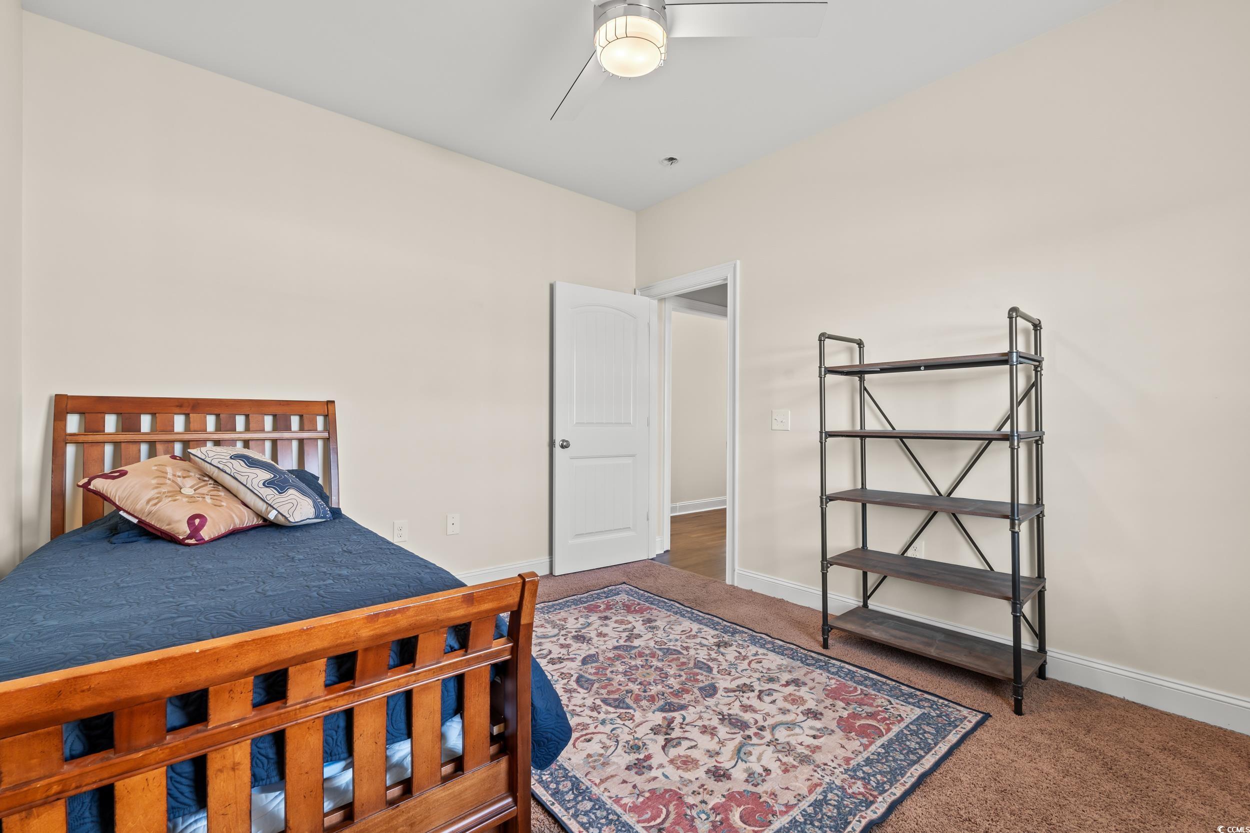 153 Grier Crossing Road Conway, SC 29526 - Photo 18 of 26 Carpeted bedroom featuring baseboards and a ceiling fan
