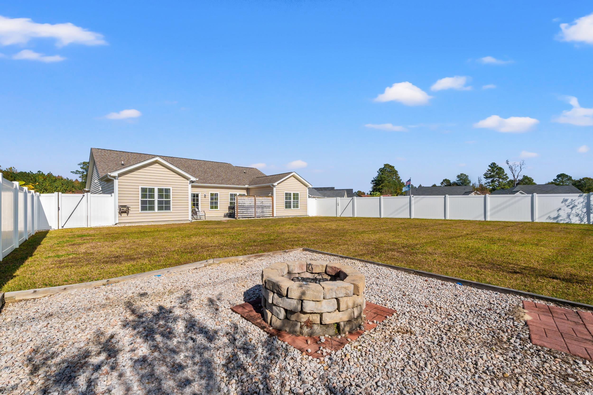 153 Grier Crossing Road Conway, SC 29526 - Photo 20 of 26 Fenced backyard featuring a patio