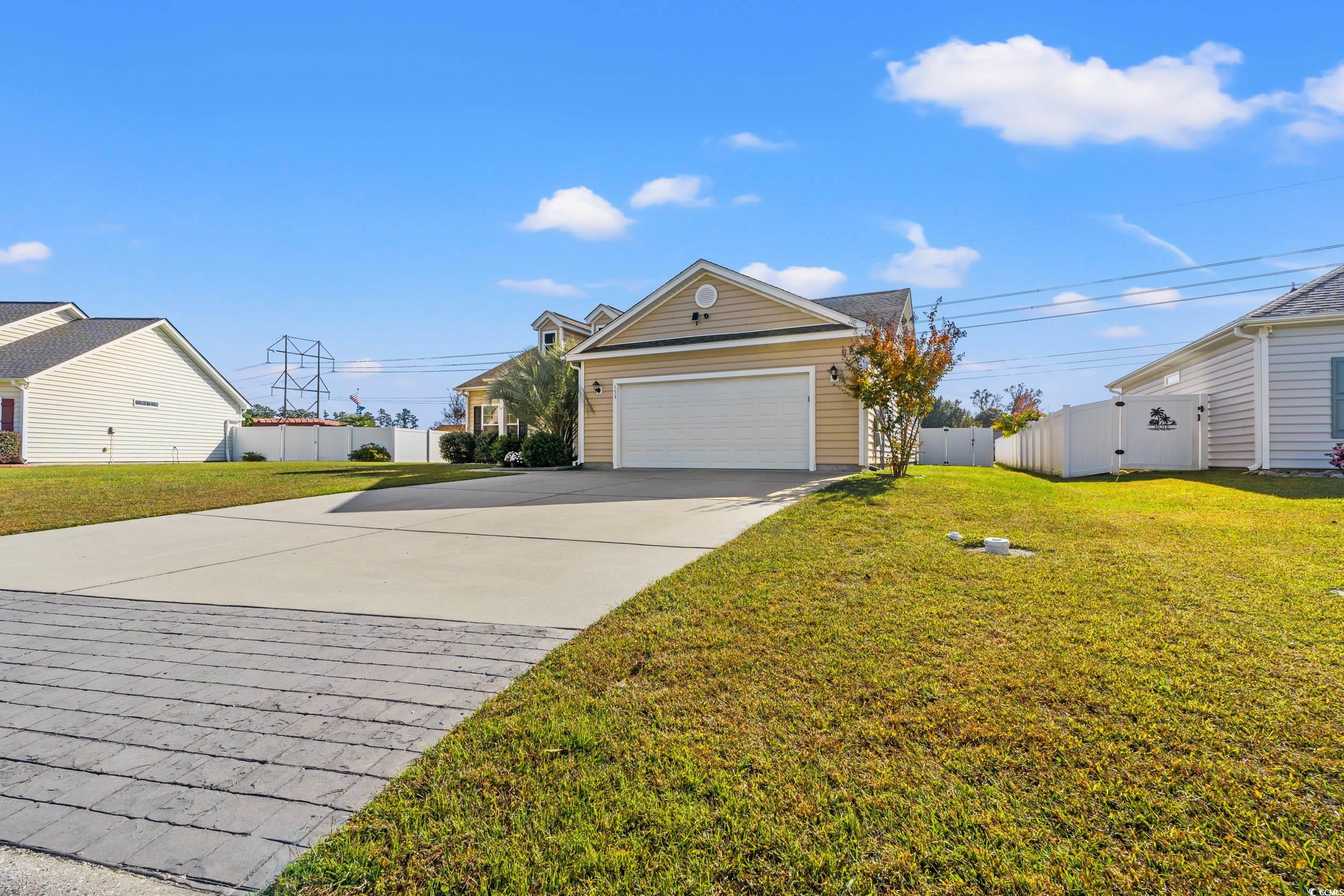 153 Grier Crossing Road Conway, SC 29526 - Photo 24 of 26 View of front of property featuring driveway and an attached garage
