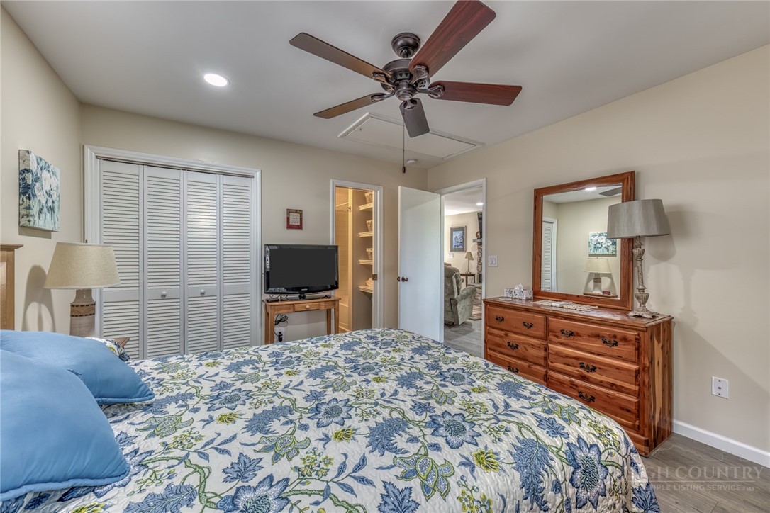 174 Spruce Pine Road Newland, NC 28657 - Photo 19 of 50 a bedroom with a bed and a flat screen tv