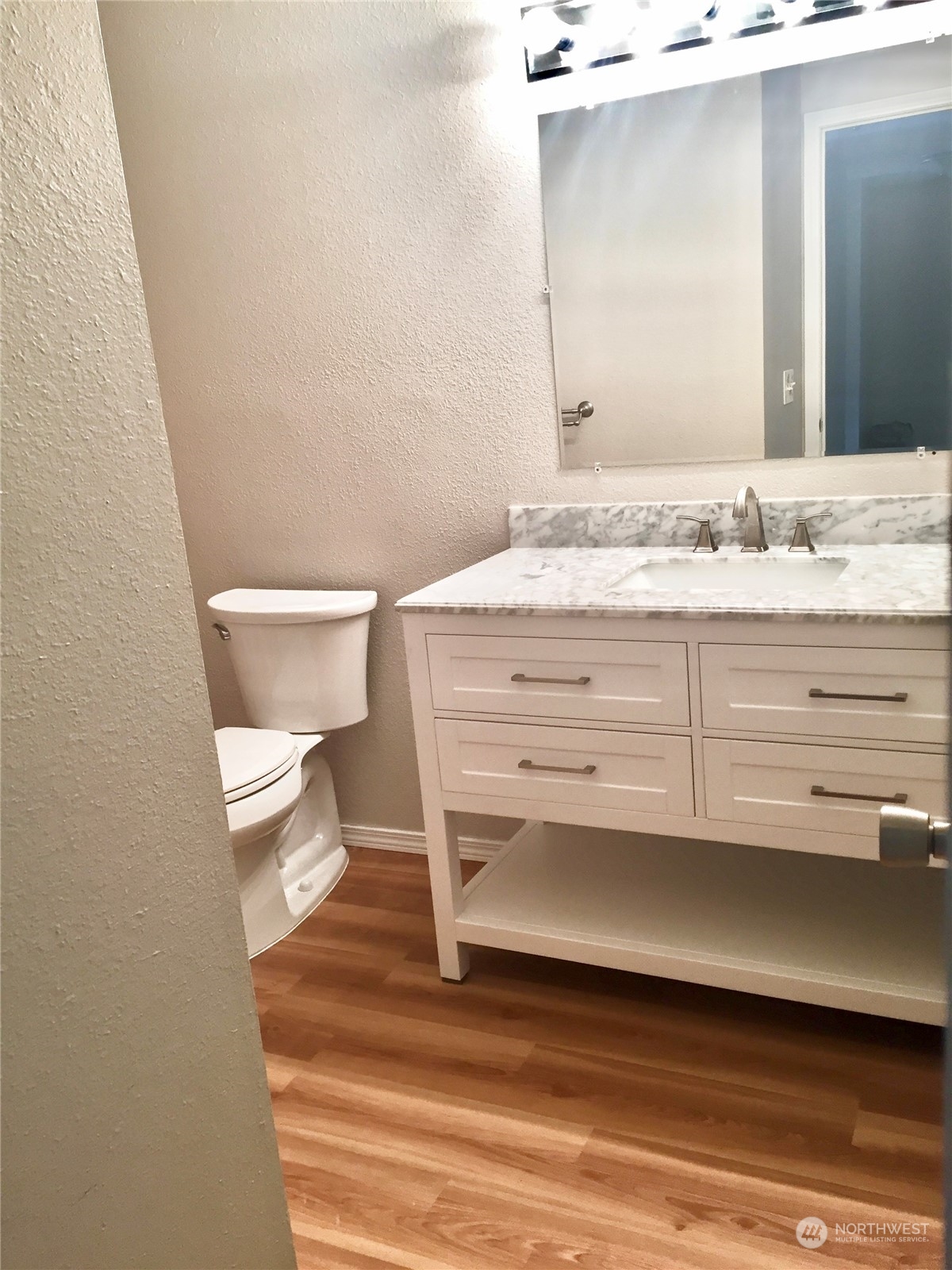 1800 Southwest 318th Place, Unit D Federal Way, WA 98023 - Photo 11 of 22 a bathroom with a sink and a toilet
