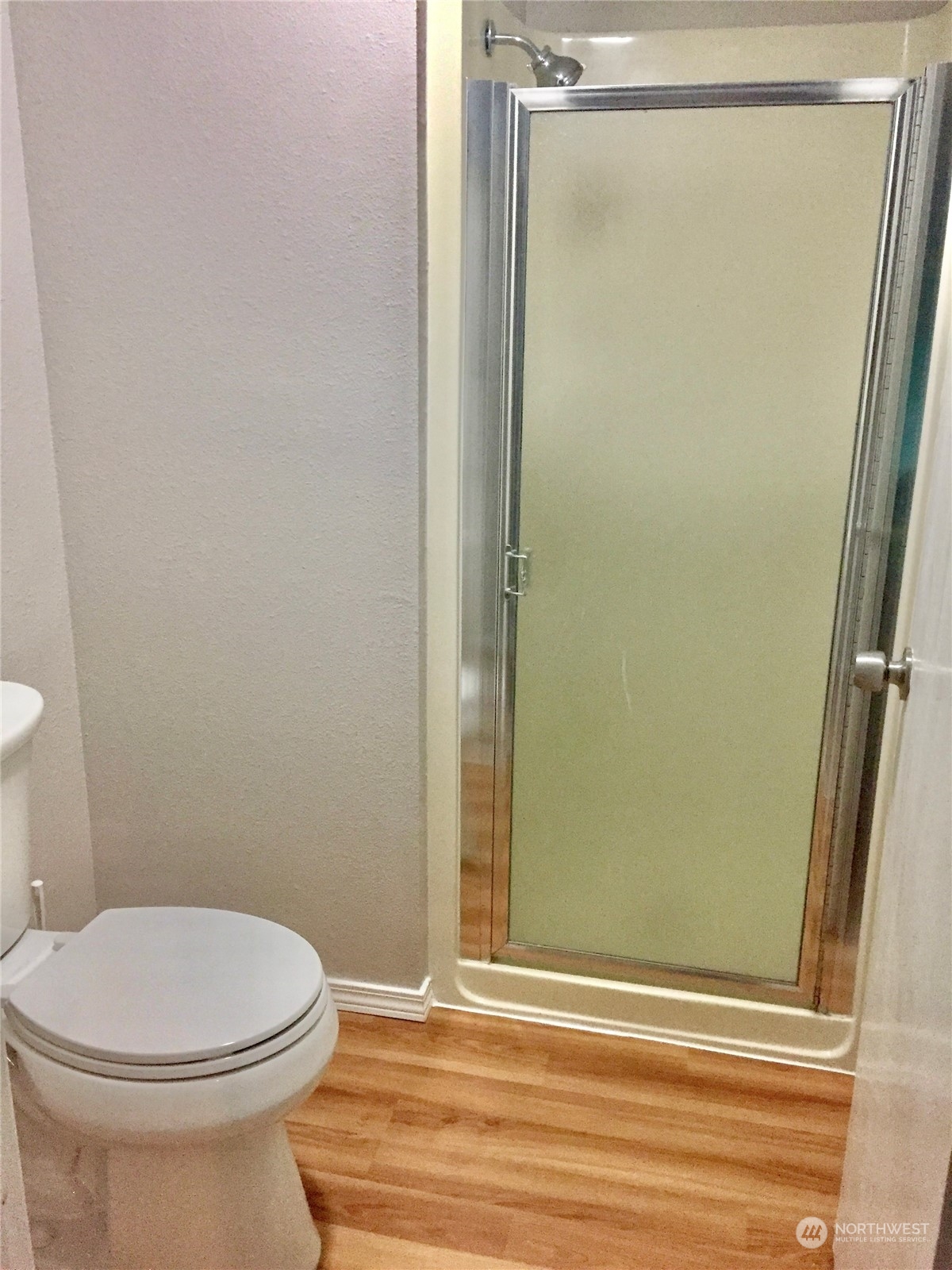 1800 Southwest 318th Place, Unit D Federal Way, WA 98023 - Photo 13 of 22 a bathroom with a toilet and a shower