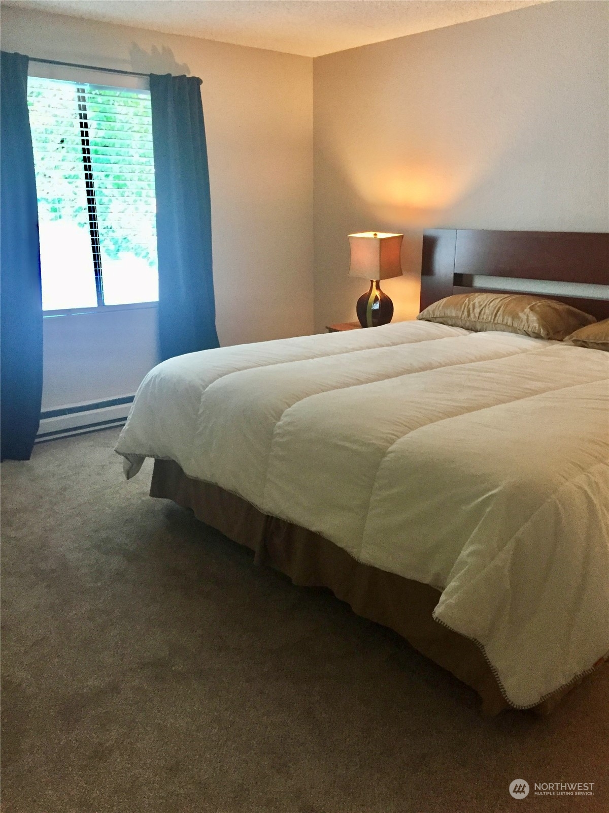 1800 Southwest 318th Place, Unit D Federal Way, WA 98023 - Photo 15 of 22 a bedroom with a bed and window