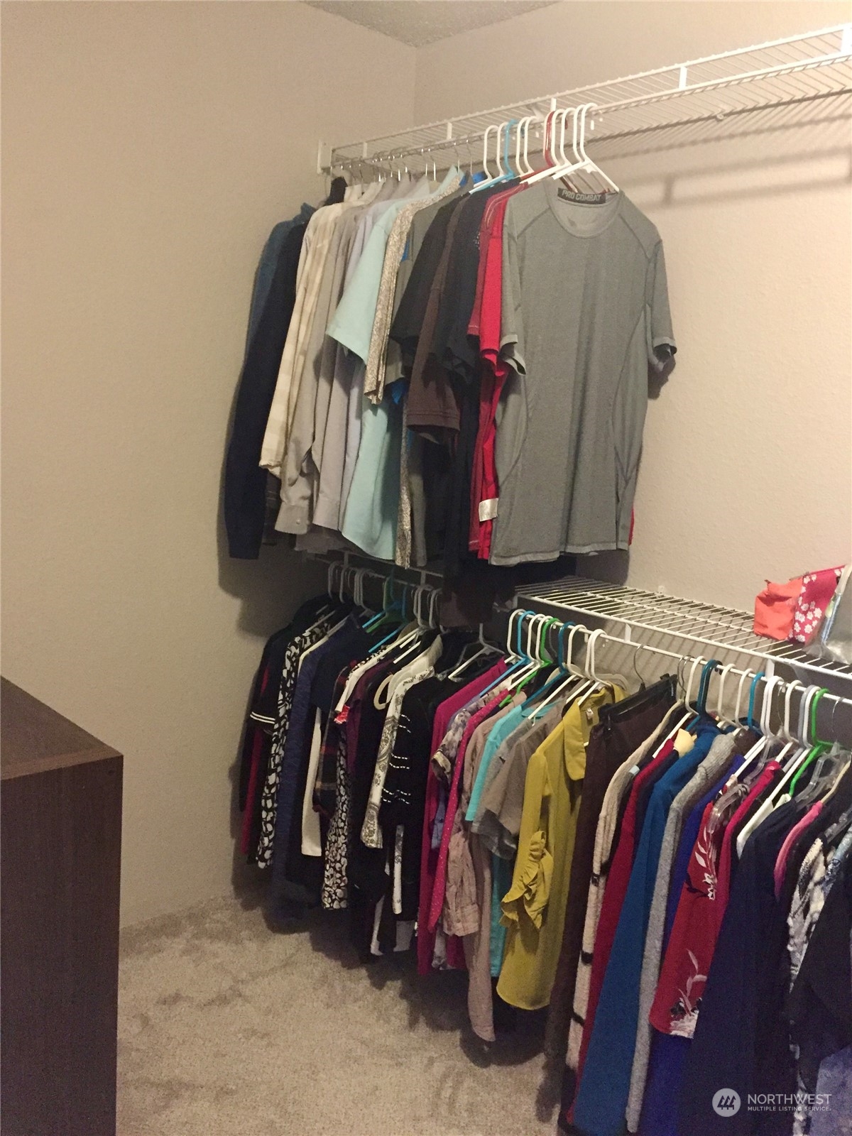1800 Southwest 318th Place, Unit D Federal Way, WA 98023 - Photo 16 of 22 a view of walk in closet with clothes and shoes