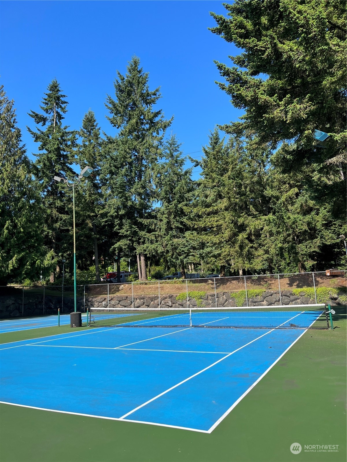 1800 Southwest 318th Place, Unit D Federal Way, WA 98023 - Photo 19 of 22 a view of a tennis court