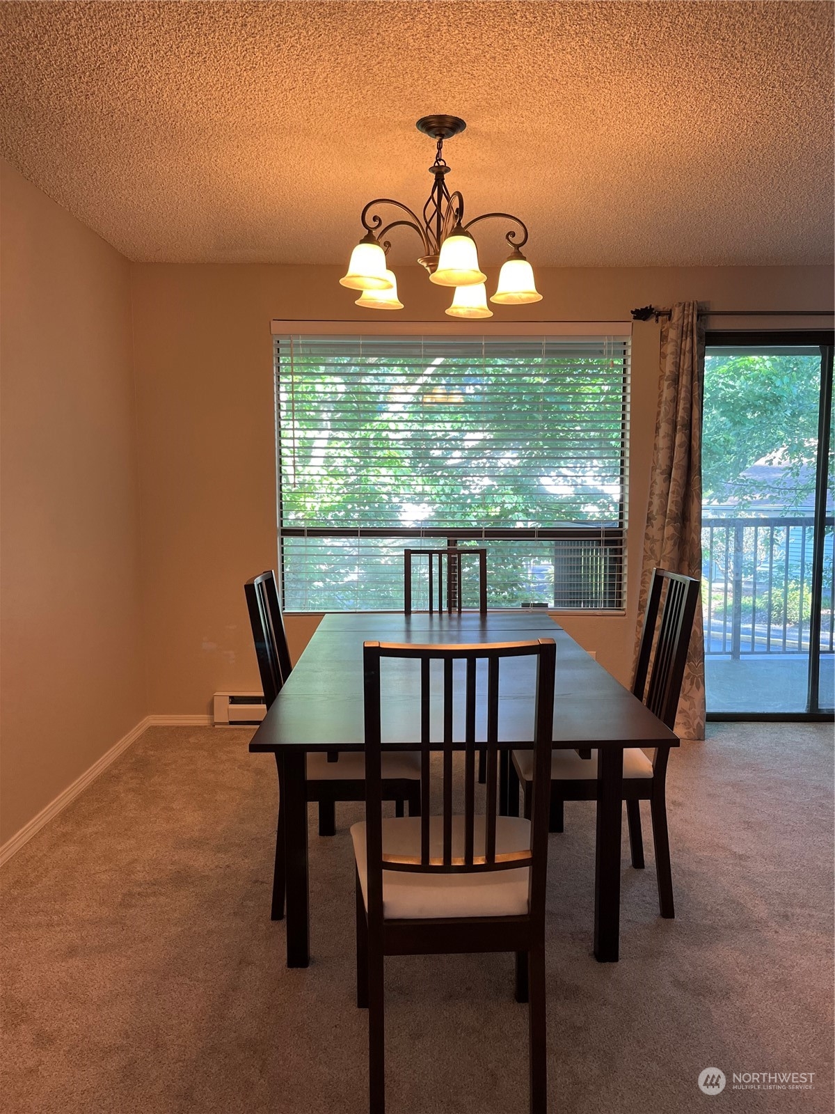 1800 Southwest 318th Place, Unit D Federal Way, WA 98023 - Photo 2 of 22 a view of a dining room with furniture window and outside view