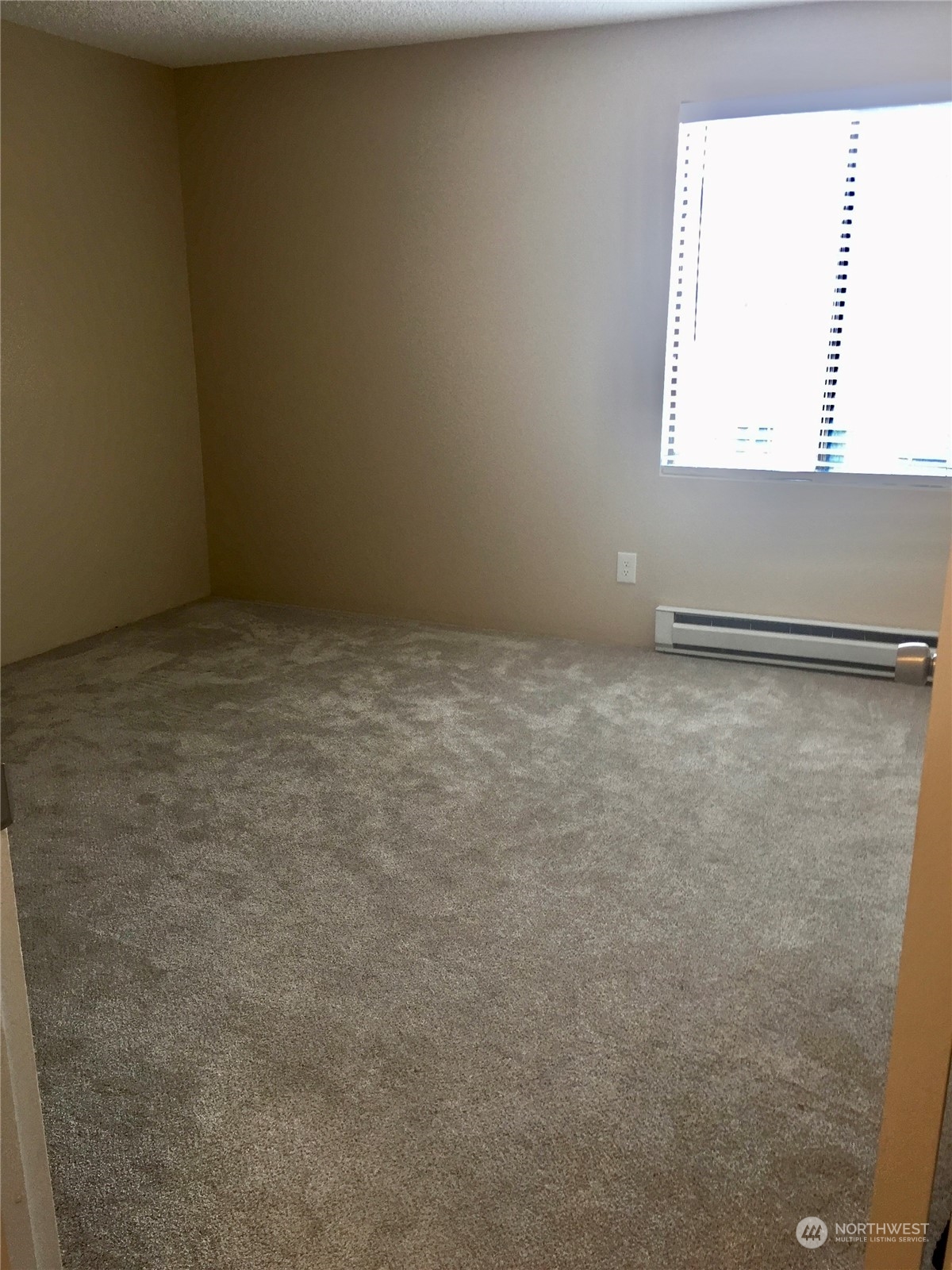 1800 Southwest 318th Place, Unit D Federal Way, WA 98023 - Photo 8 of 22 a view of an empty room and a window