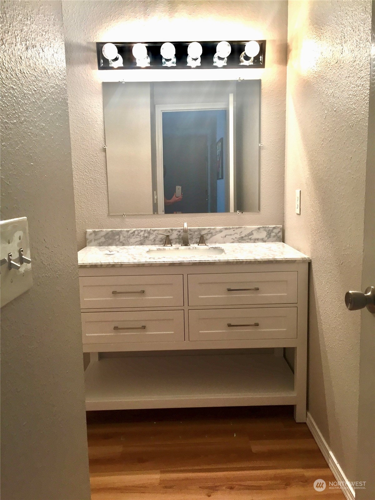 1800 Southwest 318th Place, Unit D Federal Way, WA 98023 - Photo 10 of 22 a bathroom with a sink and a mirror