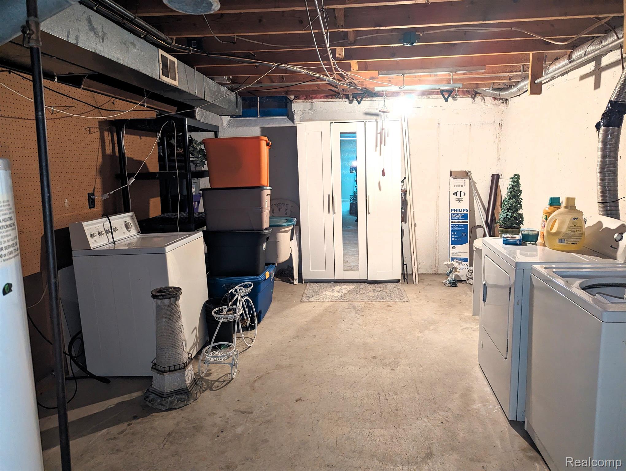 57287 Beaconsfield Road, Unit 36 Washington, MI 48094 - Photo 15 of 15 Large laundry/utility room