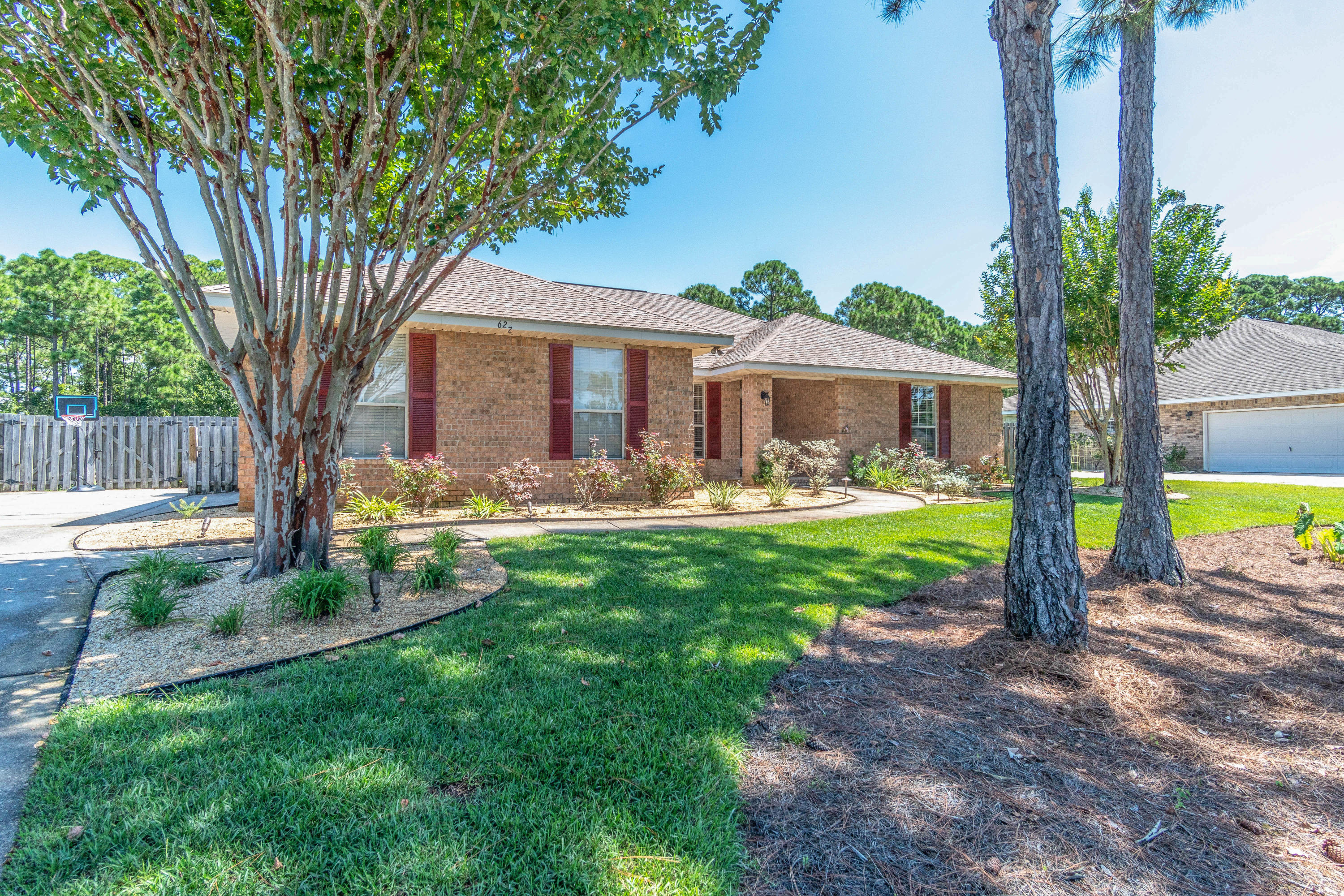 622 East Shipwreck Road Santa Rosa Beach, FL 32459 - Photo 1 of 39 a front view of a house with garden