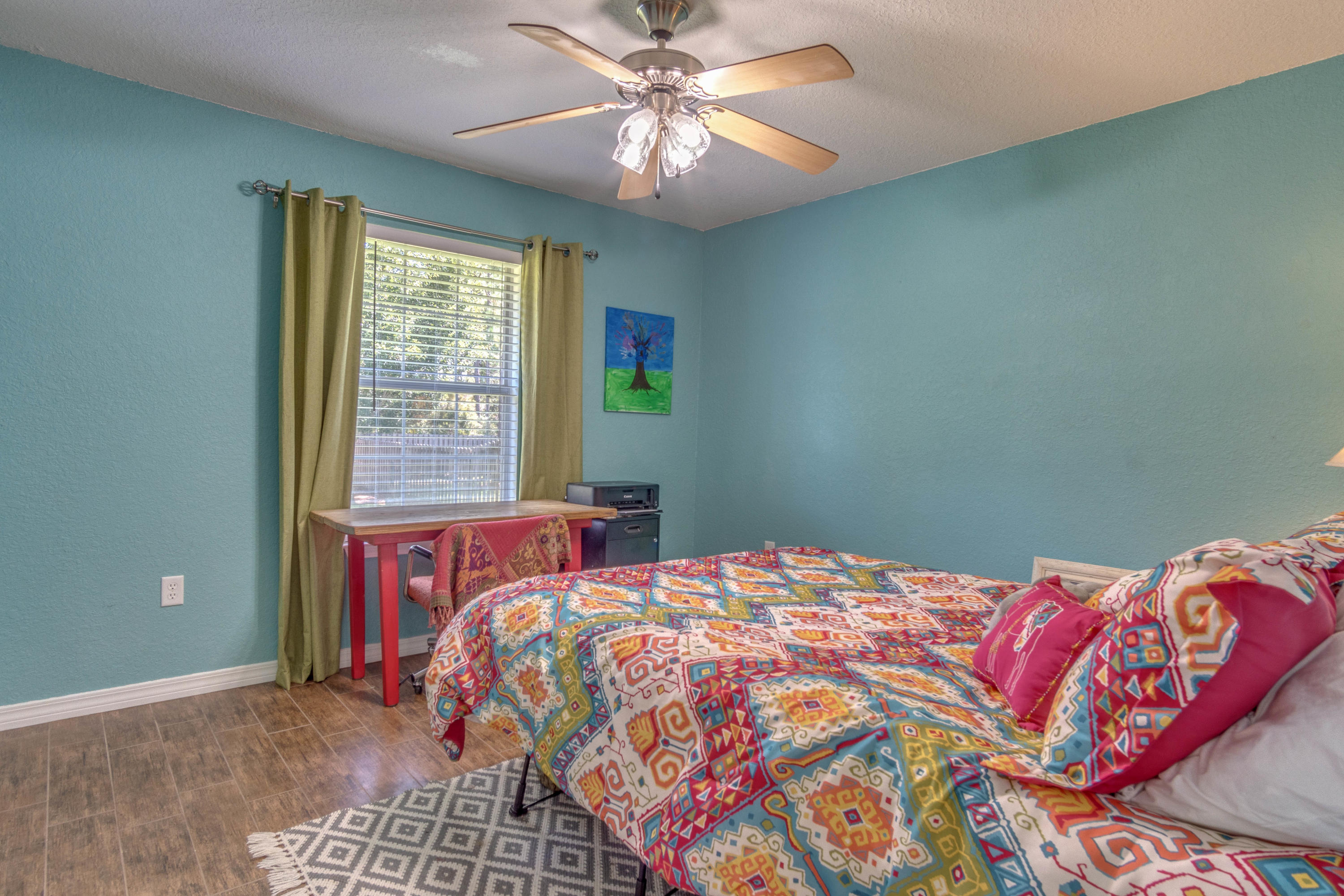 622 East Shipwreck Road Santa Rosa Beach, FL 32459 - Photo 15 of 39 a bedroom with a bed and a window