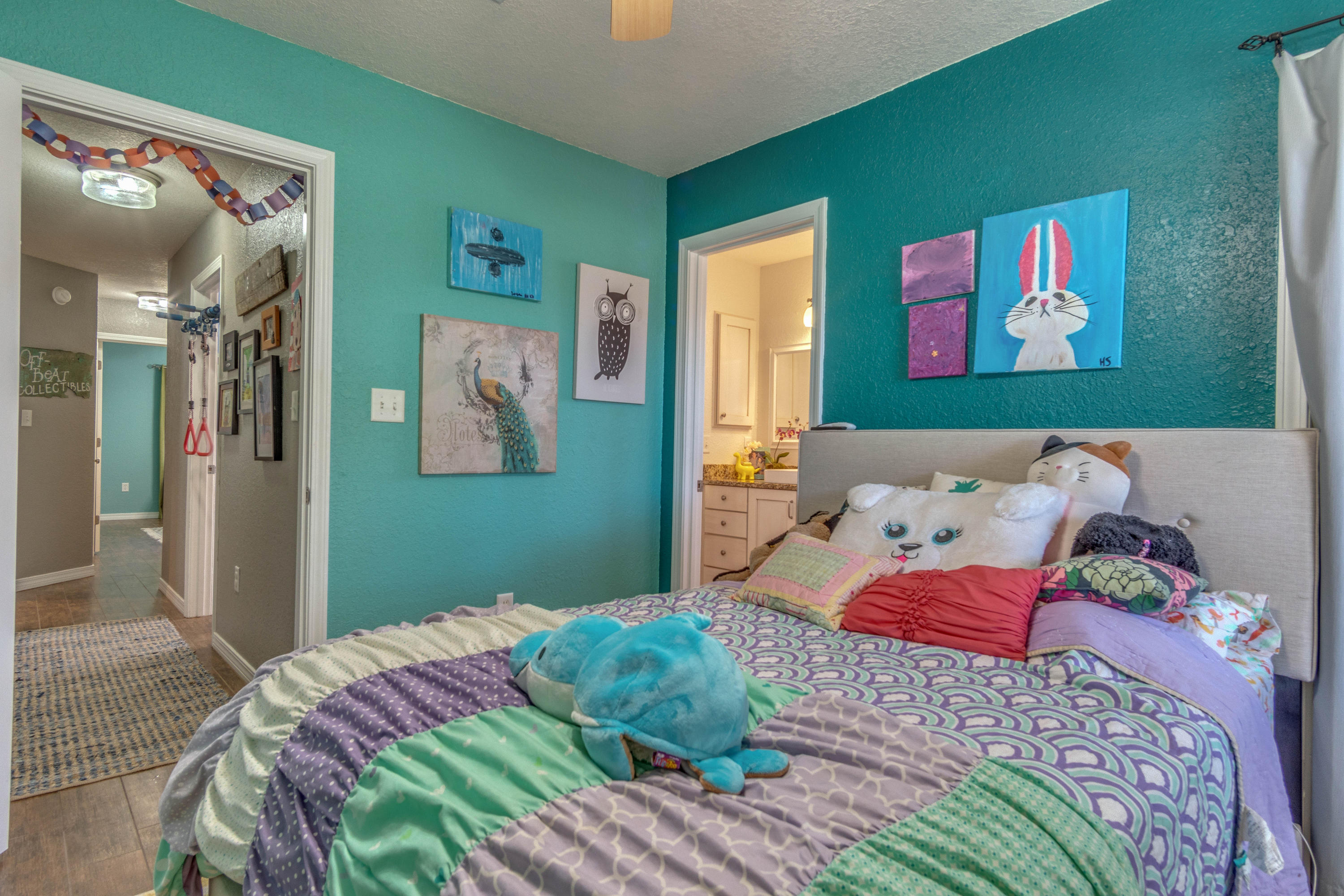 622 East Shipwreck Road Santa Rosa Beach, FL 32459 - Photo 18 of 39 a bedroom with a bed and a painting on the wall