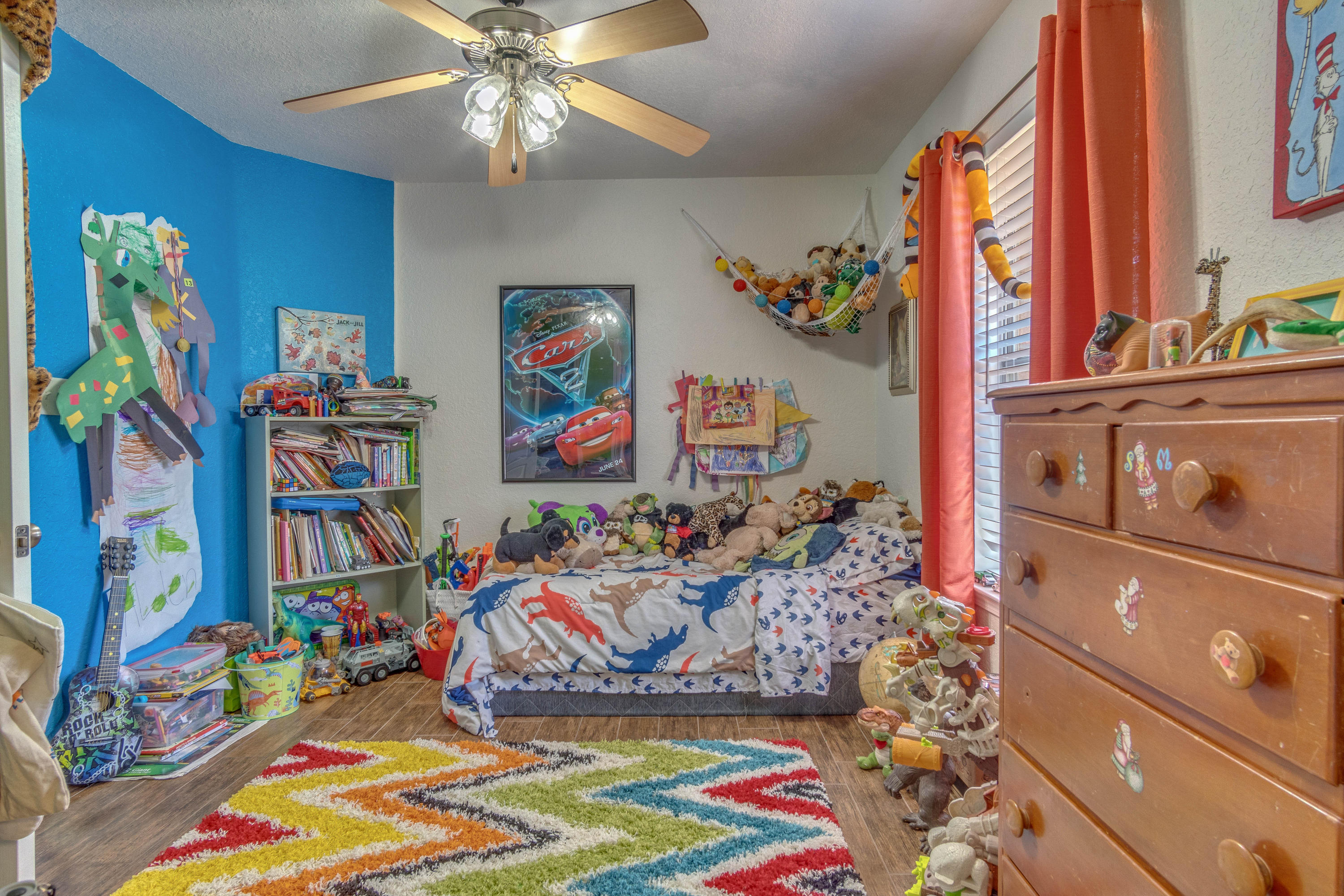622 East Shipwreck Road Santa Rosa Beach, FL 32459 - Photo 20 of 39 a room with lots of different colored cloths