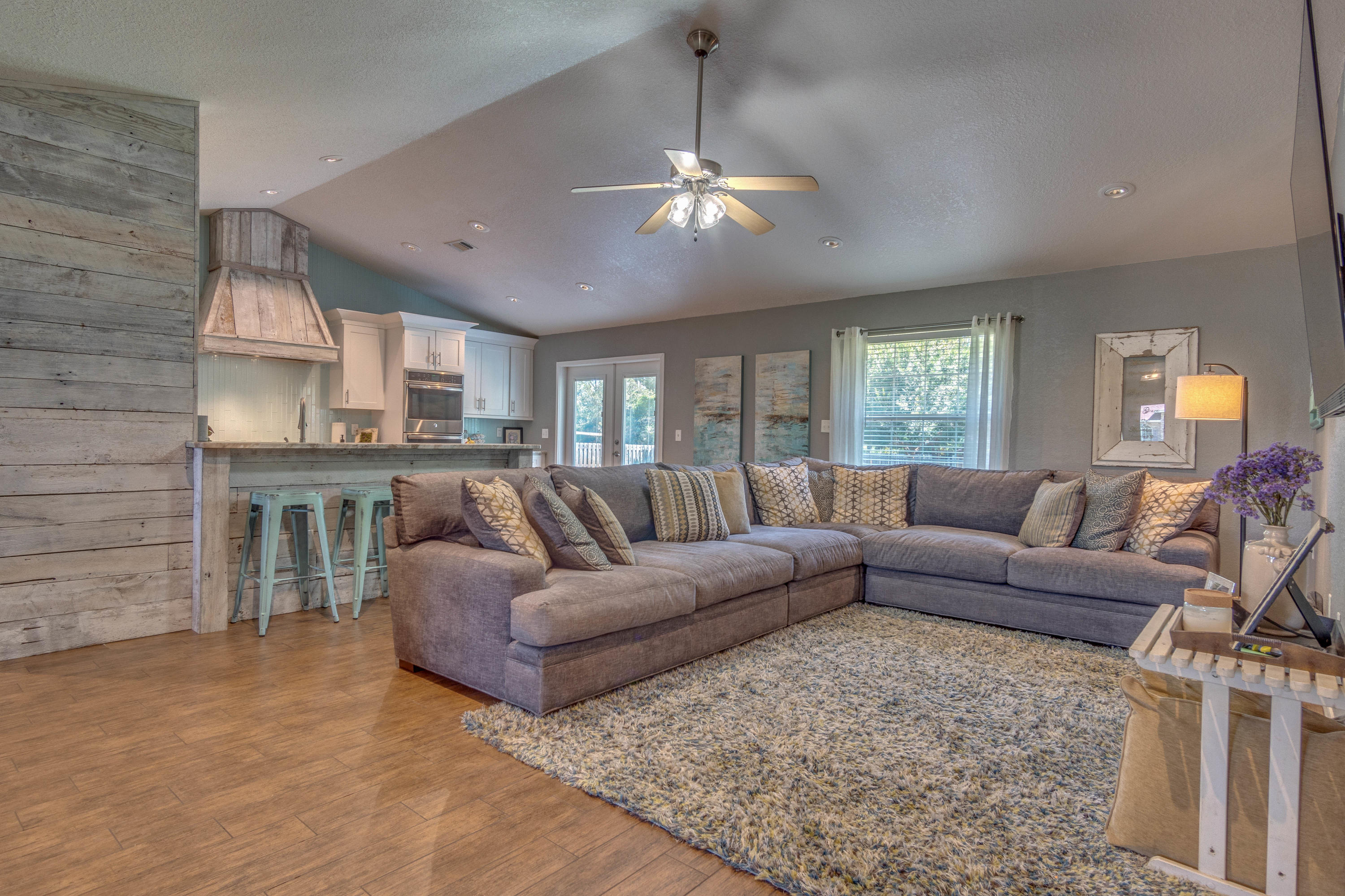622 East Shipwreck Road Santa Rosa Beach, FL 32459 - Photo 3 of 39 a living room with furniture and a fireplace