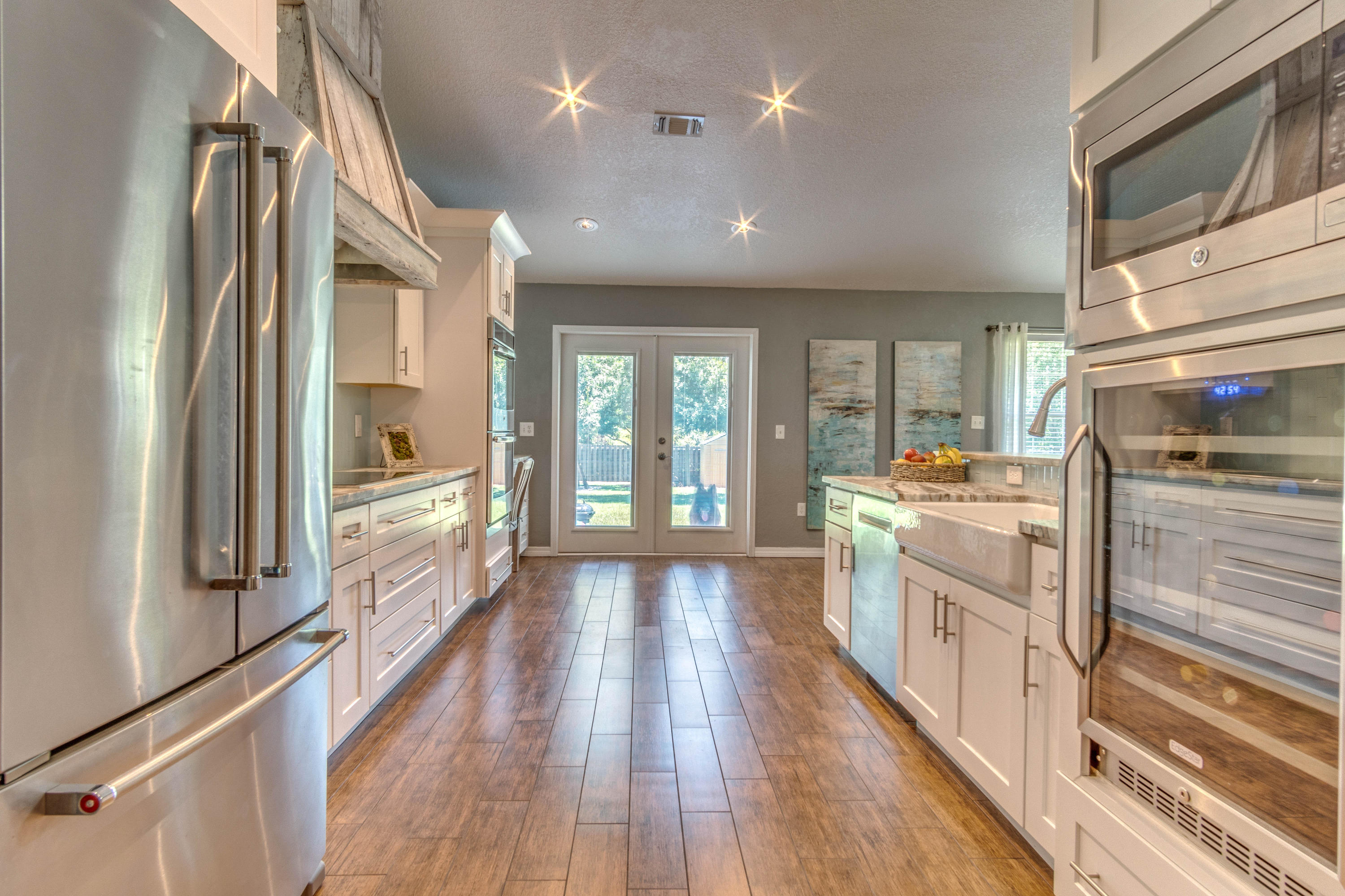 622 East Shipwreck Road Santa Rosa Beach, FL 32459 - Photo 8 of 39 a large kitchen with stainless steel appliances a lot of counter space and a large window