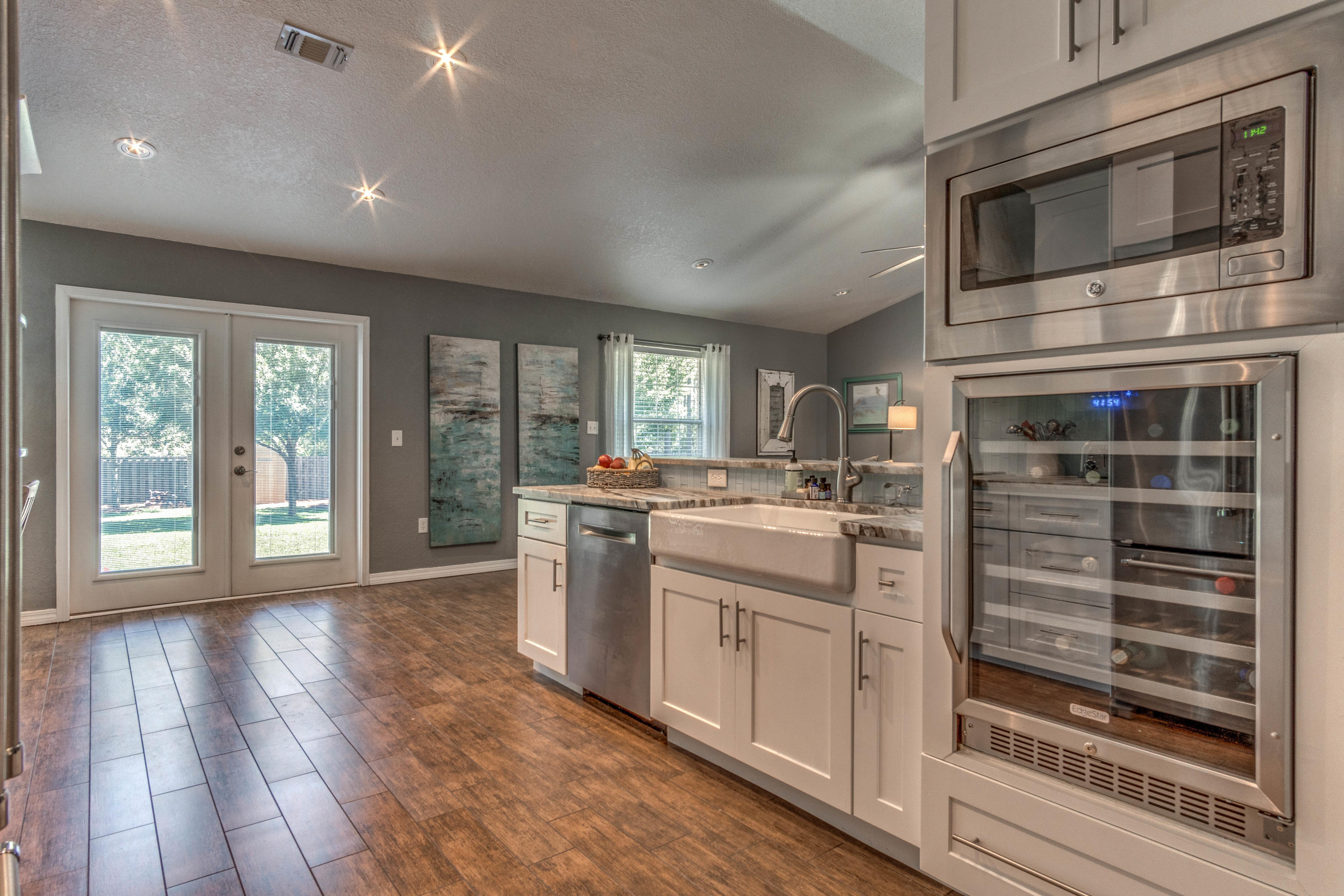 622 East Shipwreck Road Santa Rosa Beach, FL 32459 - Photo 9 of 39 a kitchen with a sink stove and cabinets