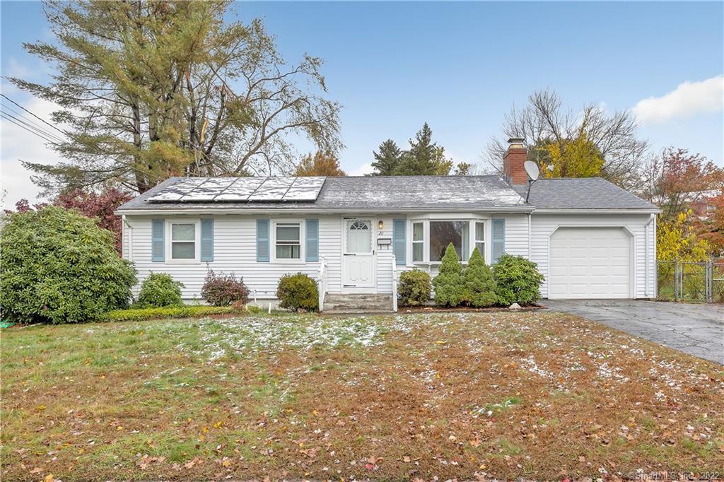 21 Mountain View Road Ansonia, CT 06401 - Photo 1 of 1 a front view of a house with a garden and outdoor space