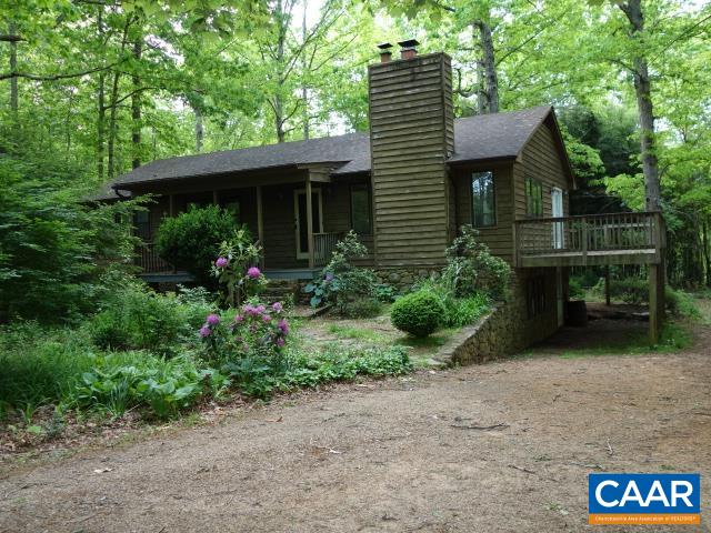 121 Rodes Valley Drive Nellysford, VA 22958 - Photo 1 of 23 a front view of a house with garden