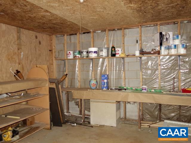 121 Rodes Valley Drive Nellysford, VA 22958 - Photo 14 of 23 a room with lots of white furniture and shower