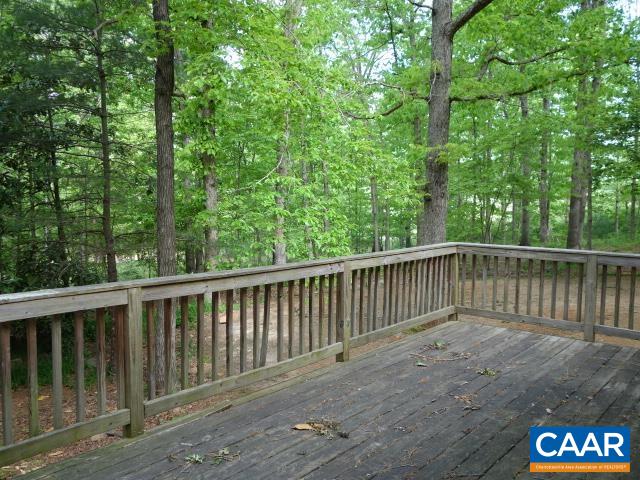 121 Rodes Valley Drive Nellysford, VA 22958 - Photo 16 of 23 a balcony with trees in front of it