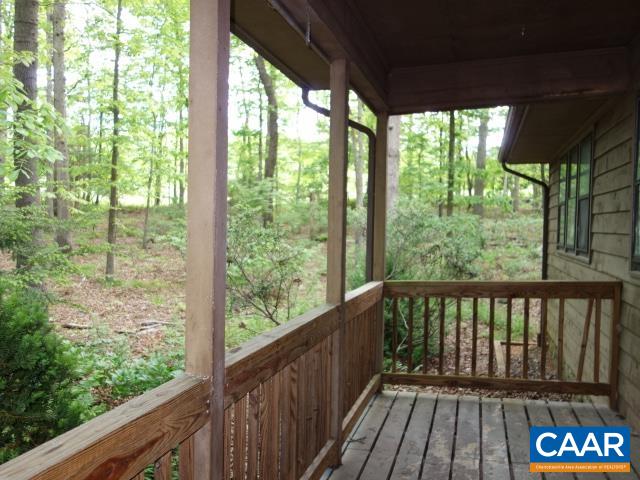 121 Rodes Valley Drive Nellysford, VA 22958 - Photo 18 of 23 a view of a porch with wooden floor