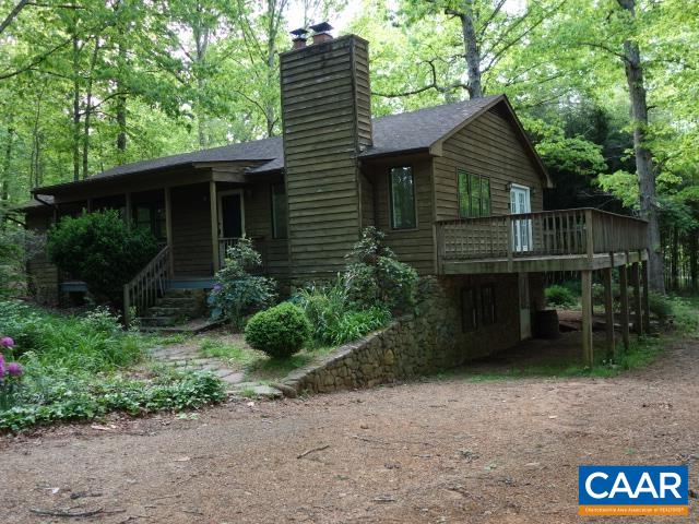 121 Rodes Valley Drive Nellysford, VA 22958 - Photo 20 of 23 a front view of a house with garden