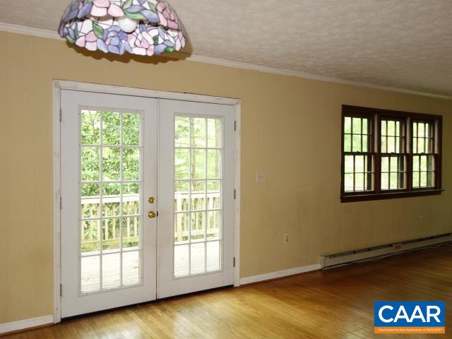 121 Rodes Valley Drive Nellysford, VA 22958 - Photo 4 of 23 a view of an empty room with a window