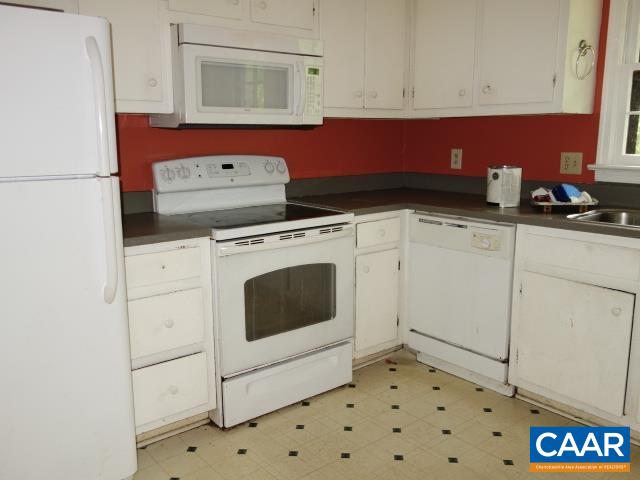 121 Rodes Valley Drive Nellysford, VA 22958 - Photo 9 of 23 a utility room with sink dryer and washer