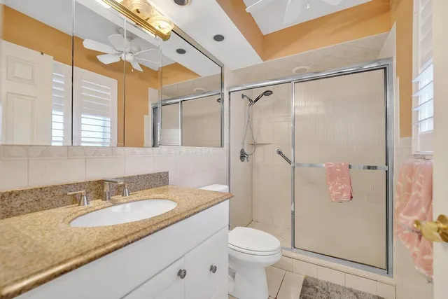 a view of a swimming pool with outdoor seating