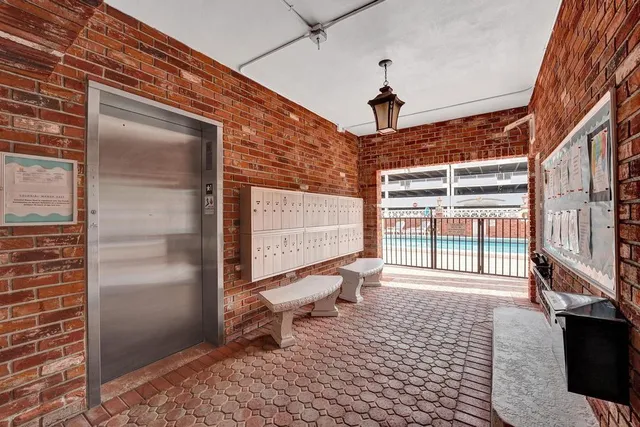 a view of a car parked in front of a building
