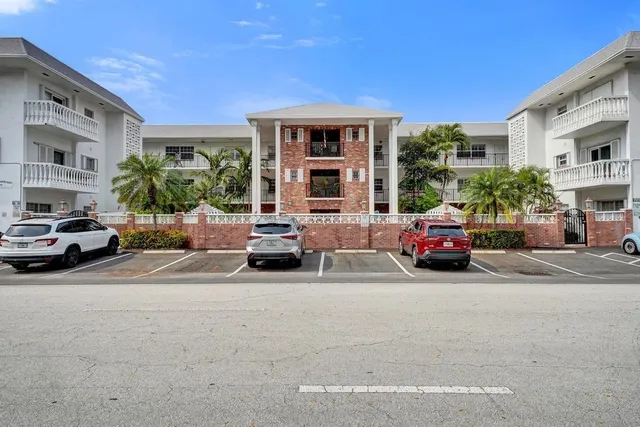 a view of a swimming pool with a lounge chairs