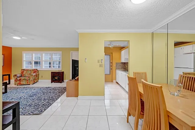 a kitchen with stainless steel appliances granite countertop a sink and a stove