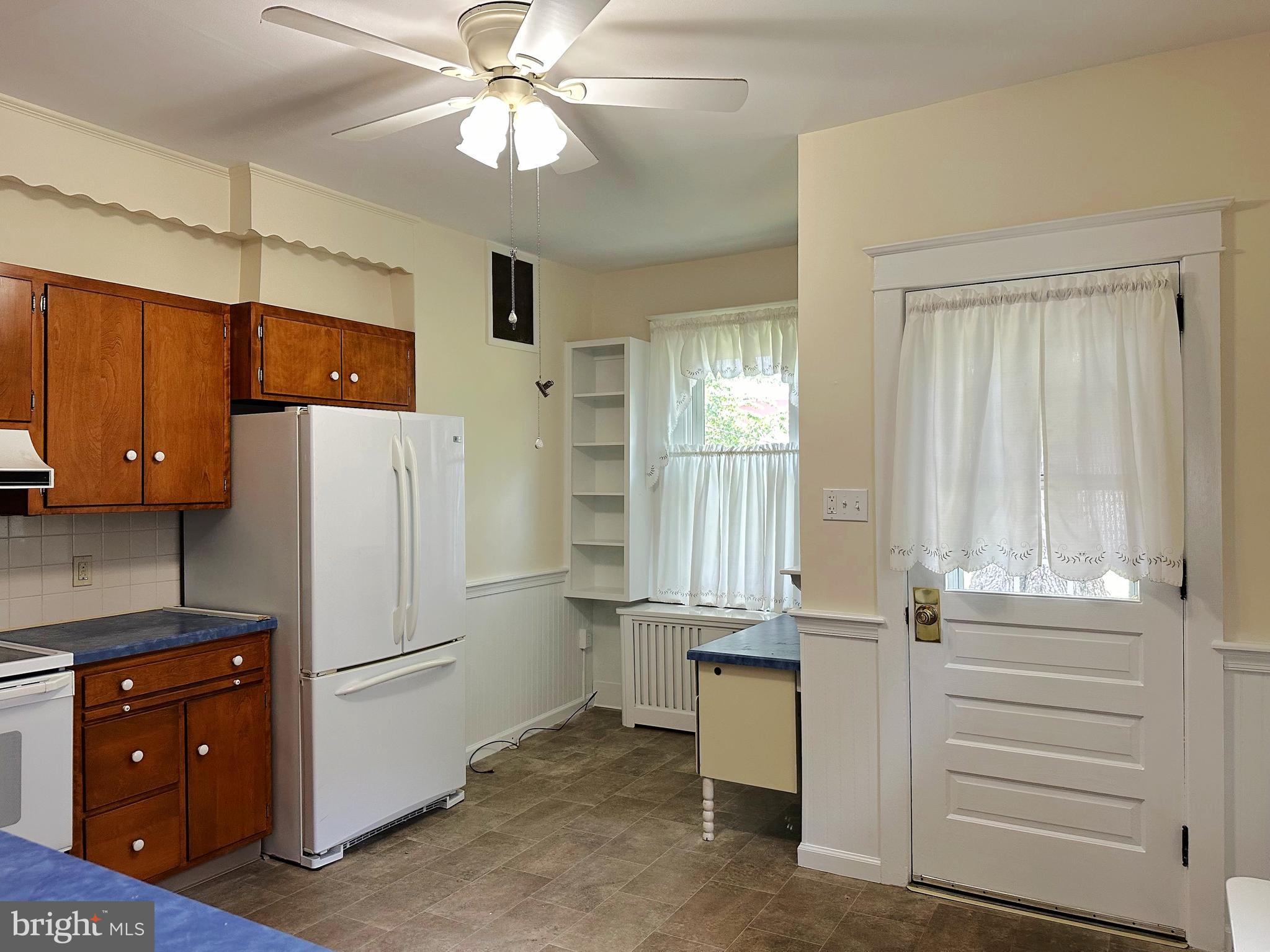 634 Main Street Red Hill, PA 18076 - Photo 11 of 34 a kitchen with a refrigerator and cabinets
