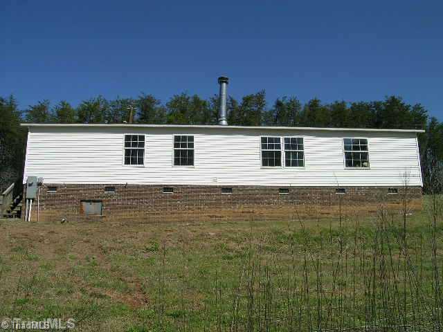 390 Henry Road Madison, NC 27025 - Photo 2 of 9 Exterior Back.