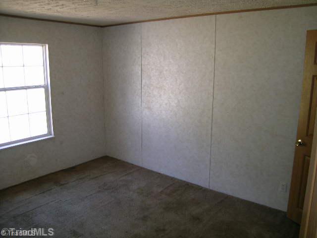 390 Henry Road Madison, NC 27025 - Photo 7 of 9 2nd Bedroom.