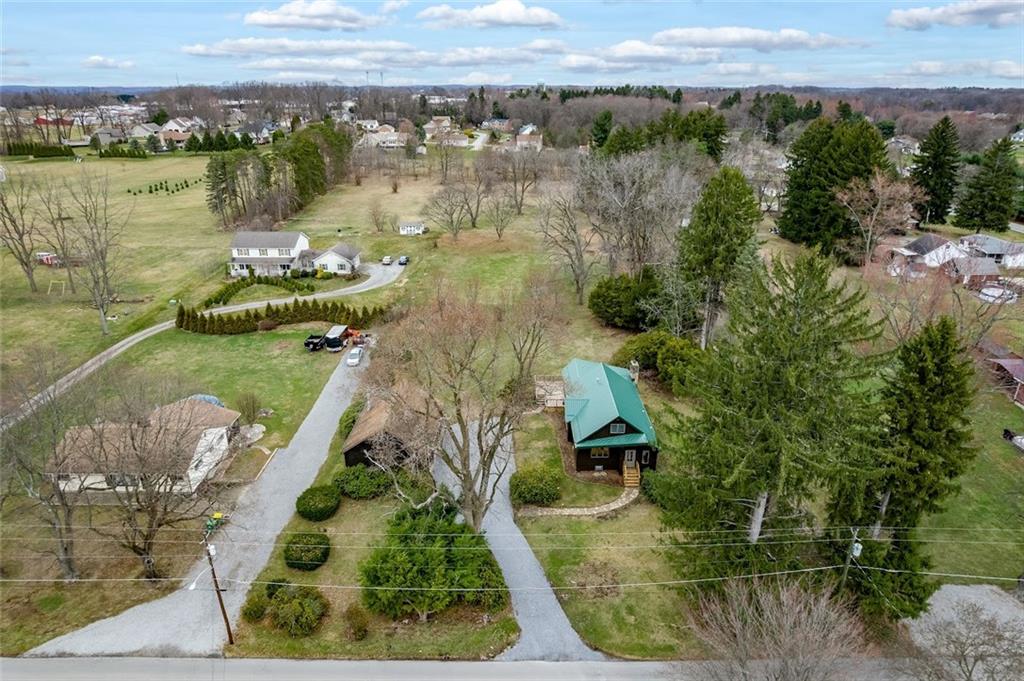 108 Buttercup Road Butler, PA 16001 - Photo 11 of 40 an aerial view of a house with a lake view
