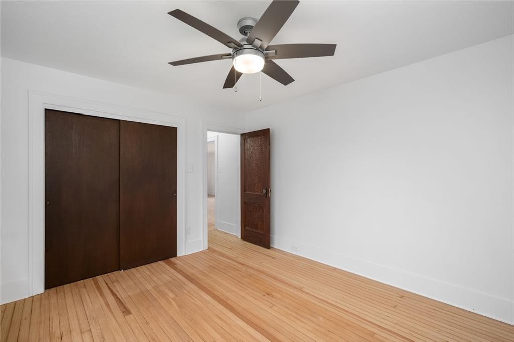 108 Buttercup Road Butler, PA 16001 - Photo 28 of 40 a view of an empty room with wooden floor