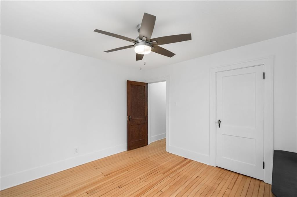 108 Buttercup Road Butler, PA 16001 - Photo 31 of 40 a view of empty room with wooden floor