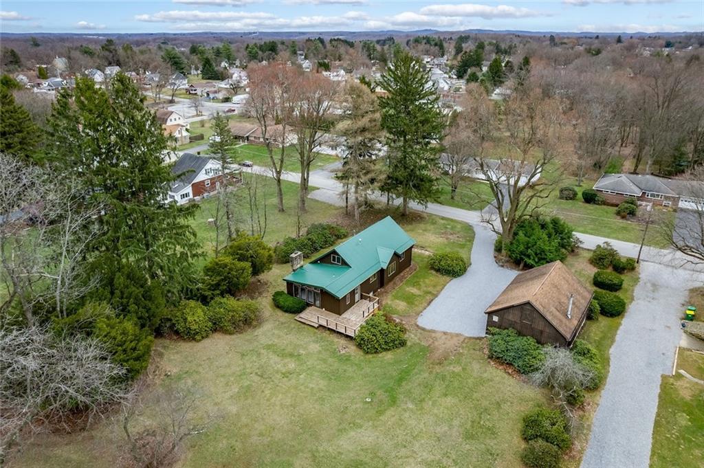 108 Buttercup Road Butler, PA 16001 - Photo 39 of 40 an aerial view of a house with a yard and lake view