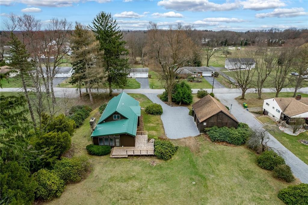 108 Buttercup Road Butler, PA 16001 - Photo 10 of 40 an aerial view of a house with a garden and lake view