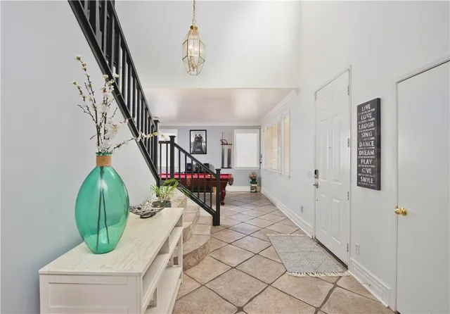 a view of entryway with stairs