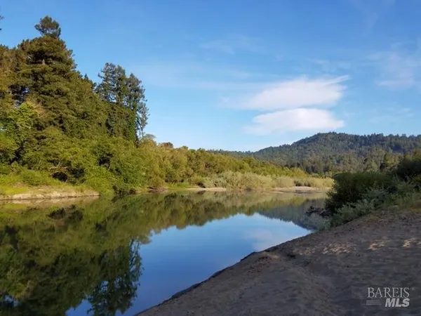 a view of a lake from a yard