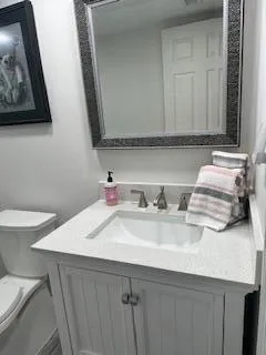 a bathroom with a sink and a toilet