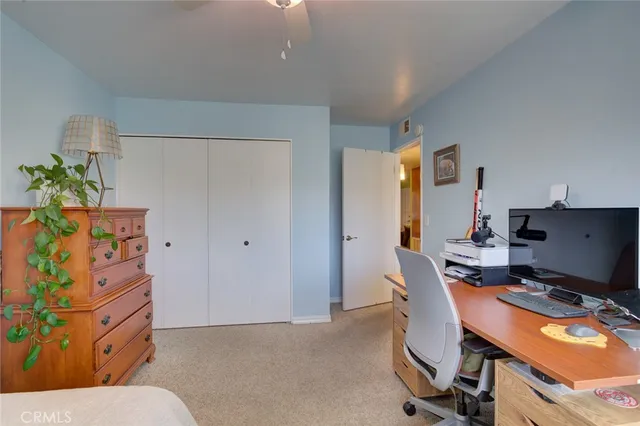 a workspace with furniture and lamp