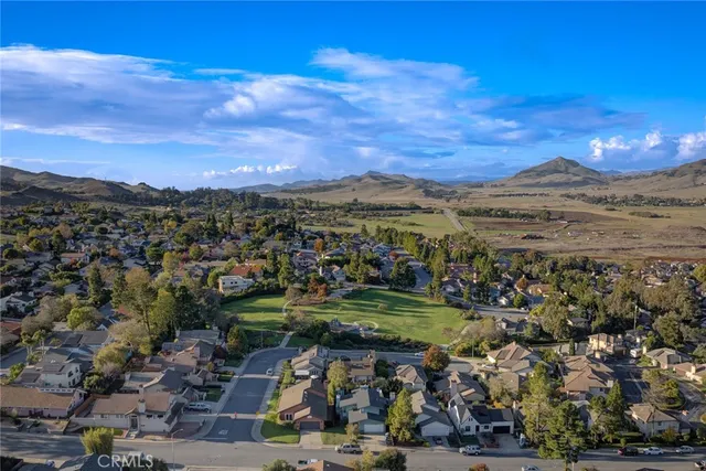 a view of a city with mountains in the background